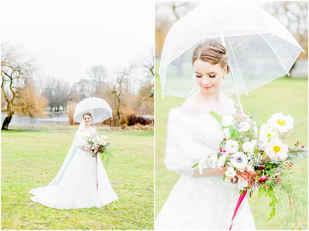 burnaby vancouver wedding bride carrying umbrella at trout lake