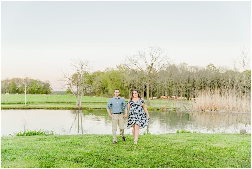 Burgessville Countryside Engagement Session Couple walking by pond