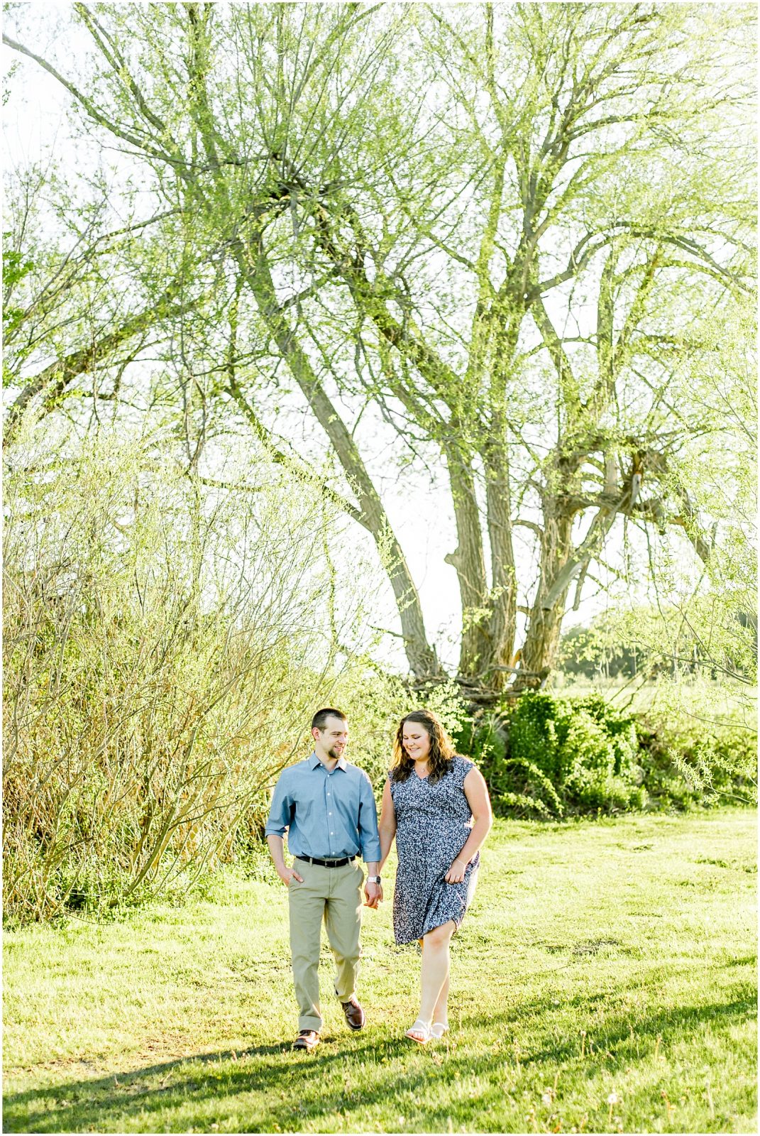 Burgessville Countryside Engagement Session Couple laughing and walking