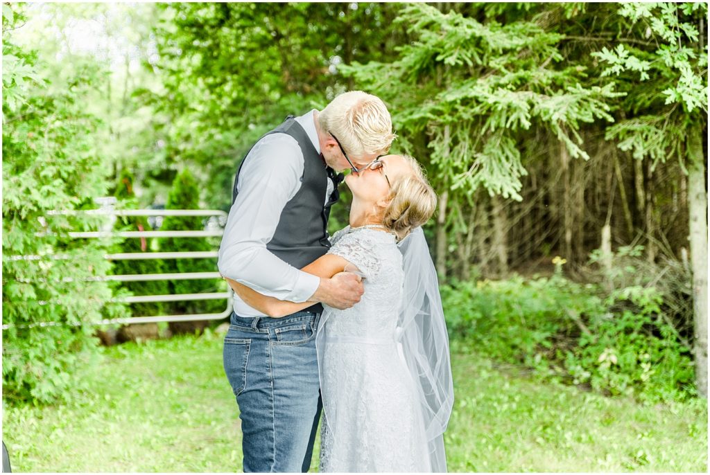 Harley Brant County horse farm wedding bride and groom first kiss