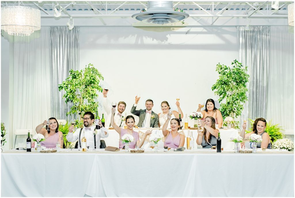 Goodwill Industries Wedding reception bridal party seated at head table